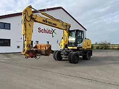 New Holland MH 5.6 inkl. Grabenlöffel, Tieflöffel